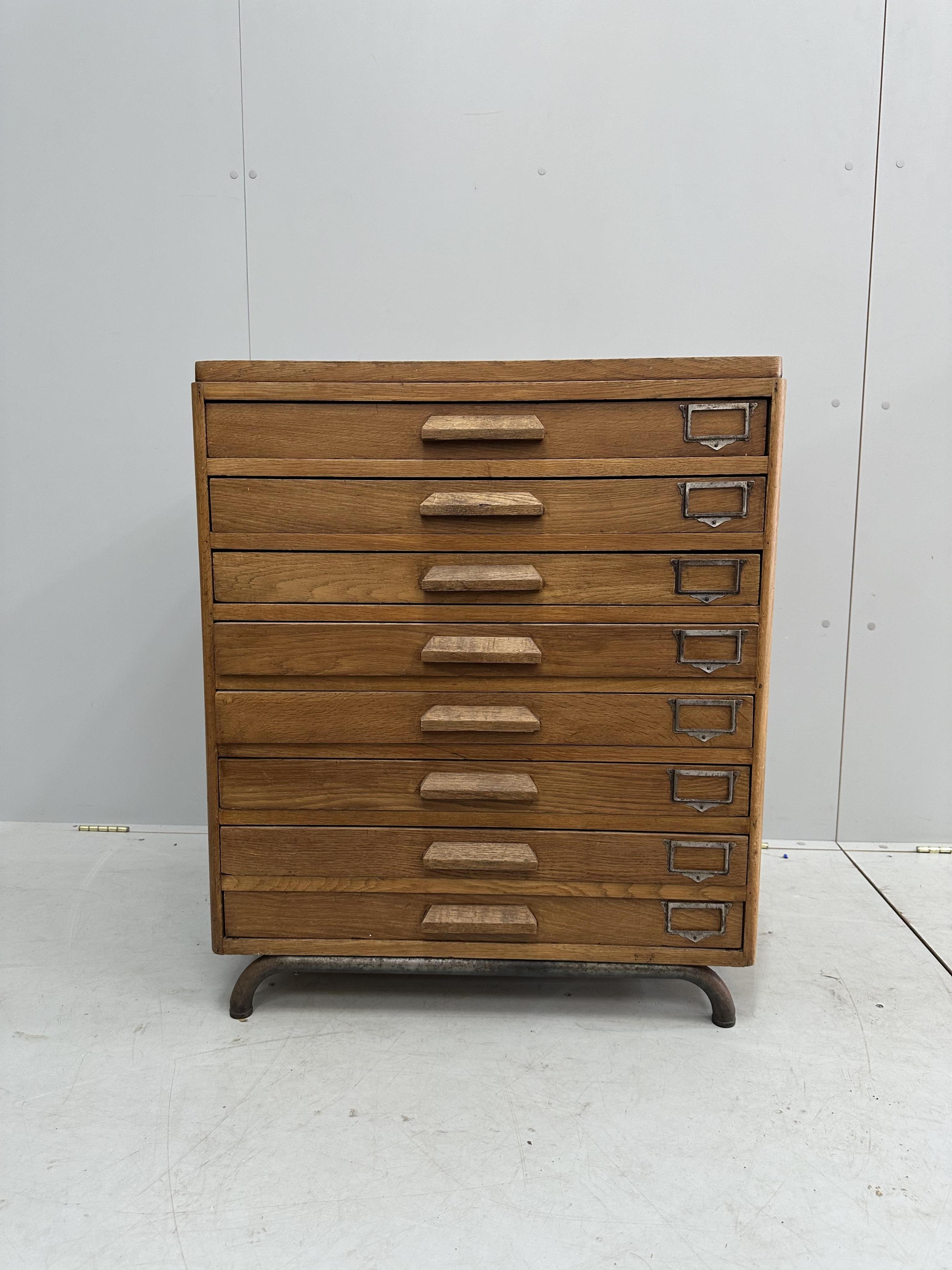 A mid century oak eight drawer plan chest, width 74cm, depth 59cm, height 88cm. Condition - fair